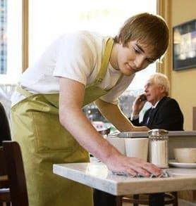 busboy cleaning tables